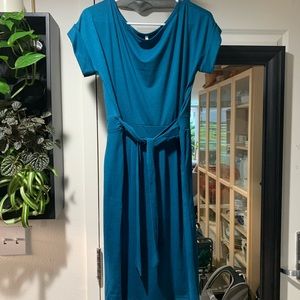 Teal dress with wrap belt.